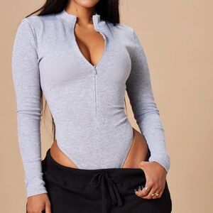 BNWOT FashionNova zip up bodysuit